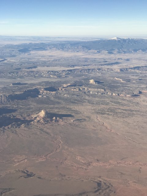 Majestic Desert and Mountain Range from Above