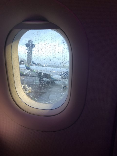 Rainy Window View from an Airplane