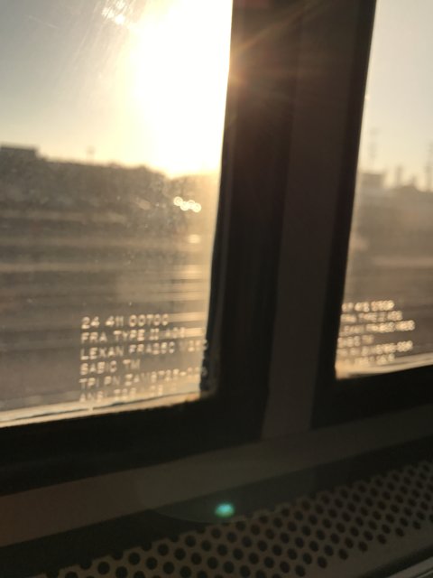 Sun's Flare Through Train Window