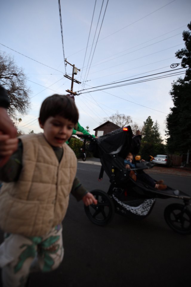 Children's Evening Bike Parade in Suburban Neighborhood