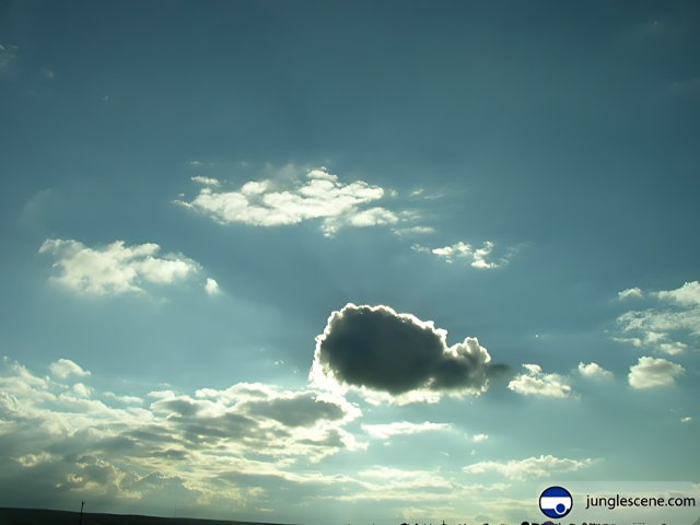 Cumulus Cloud with Sun Rays