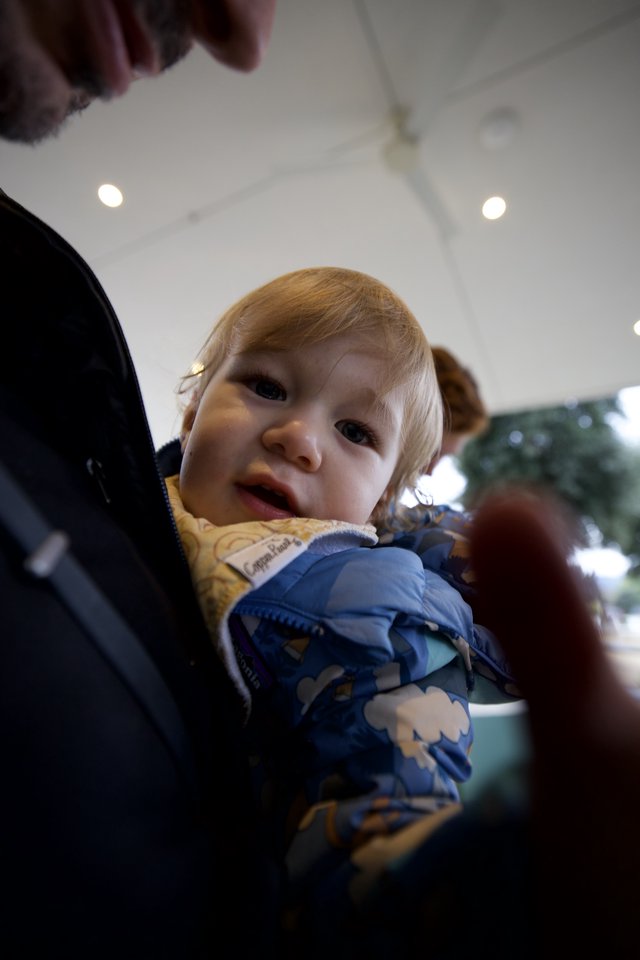 Toddler's Curious Gaze at Family Restaurant