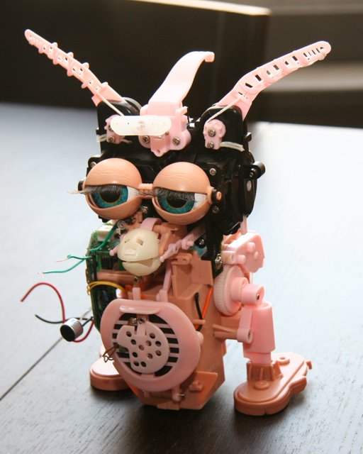 Pink-Eyed Toy Robot