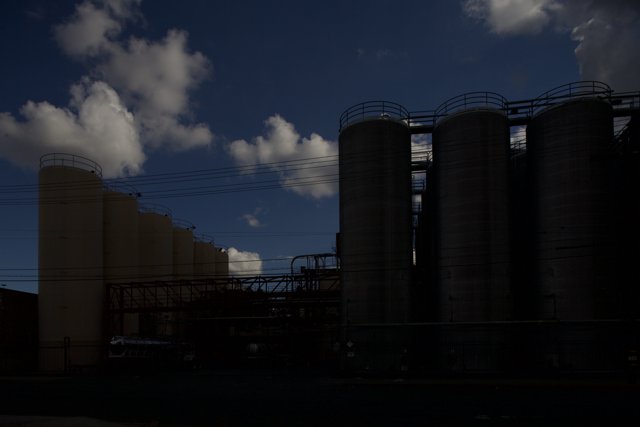 Industrial Architecture Silhouetted Against a Blue Sky