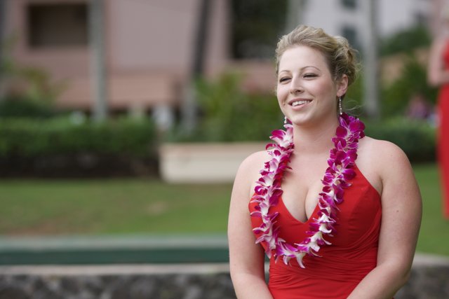 Red Dress, Lei, and Smile in Hawaii