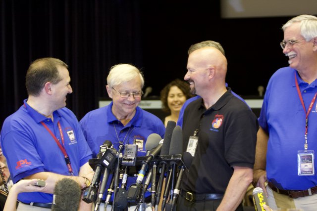 Press Conference with Blue-Shirted Men
