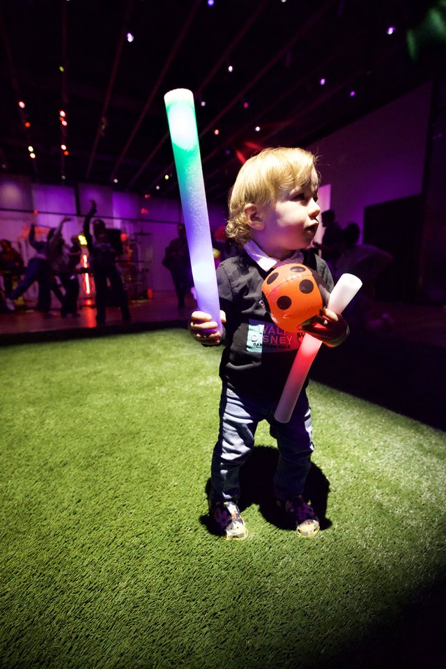 Young Child at Baby Rave Light-Up Event