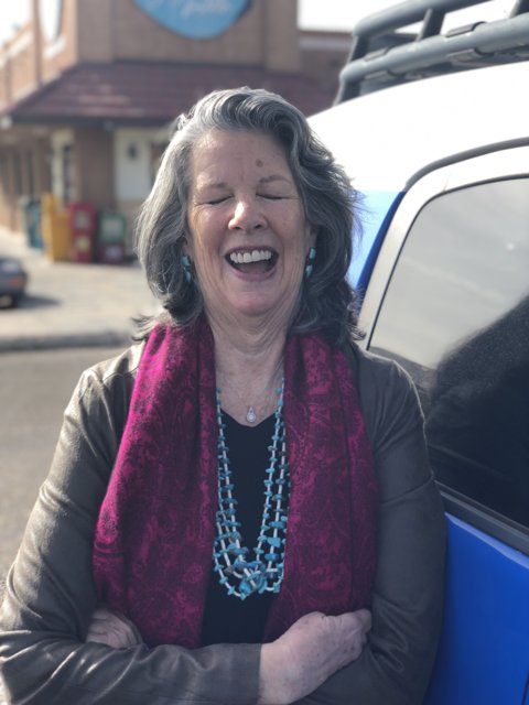 Blue Car, Purple Blouse, and Diamond Necklace: A Portrait of Rhoda B