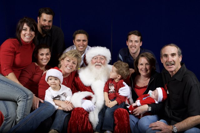 Smiling with Santa - A Family Christmas Photo