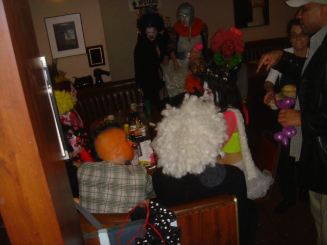 Costumed Crowd in a Living Room
