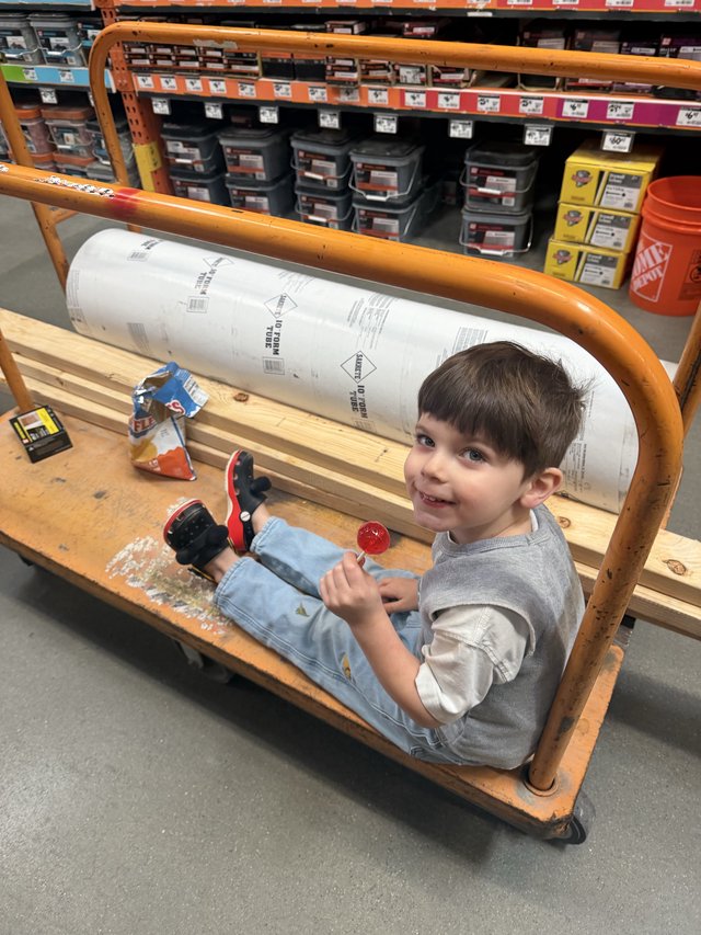 Young Boy's Hardware Store Cart Adventure
