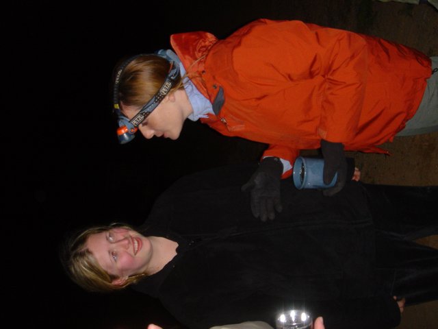 Cave Explorers Share a Laugh in the Dark