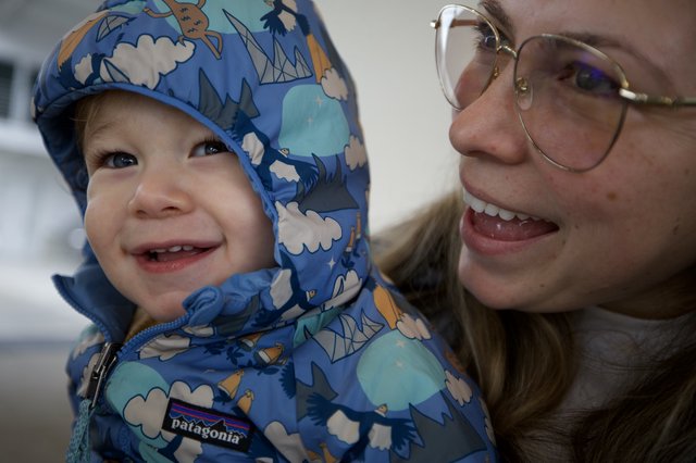 Joyful Winter Moment: Mother and Child in Patagonia Gear
