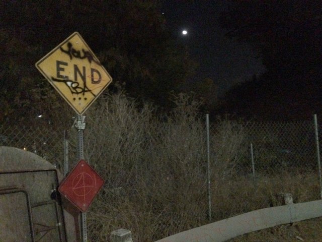 Moonlit Street Sign