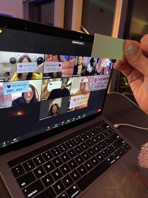 Group of People on a Laptop Card