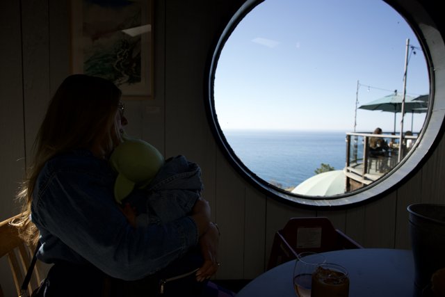 A Serene Voyage: Mother and Child at Big Sur