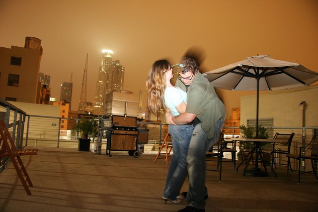 Rooftop Romance Under an Orange Night Sky