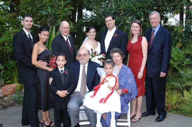 Family Wedding Portrait in Lush Garden Setting
