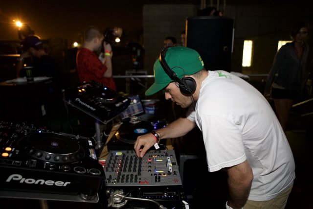Mixing Beats in Green Hat