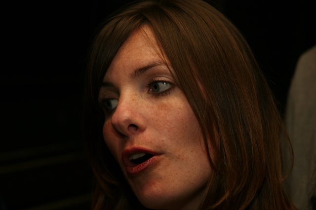 Penelope Speaking Candidly in Dramatic Low Light