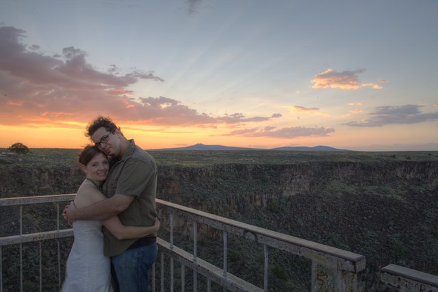 Couple Embracing at Sunset Over New Mexico Canyon