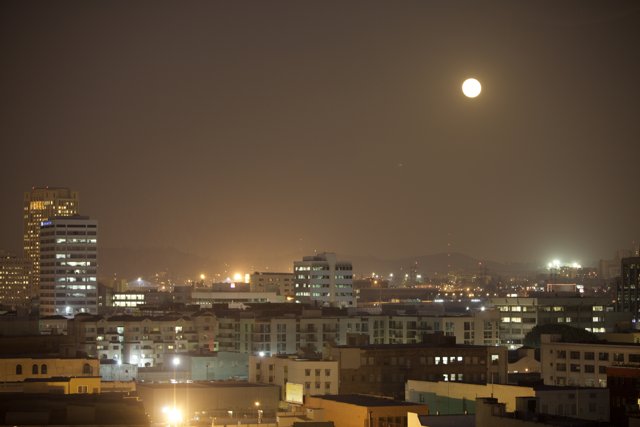 Full Moon over Urban Skyline