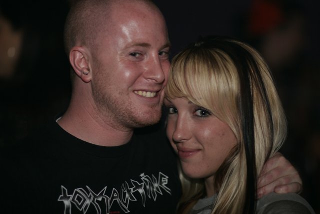 Urban Couple Poses for Night Life Portrait