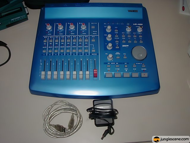 Blue Mixer with Electronic Equipment