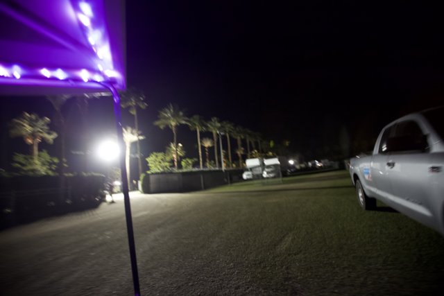 Purple Illumination on Parked Sports Car