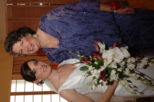 Bride and Mother Share Joyful Wedding Day Moment