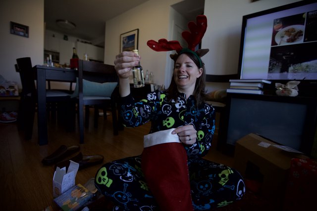 Joyful Christmas Morning Stocking Surprise with Reindeer Antlers