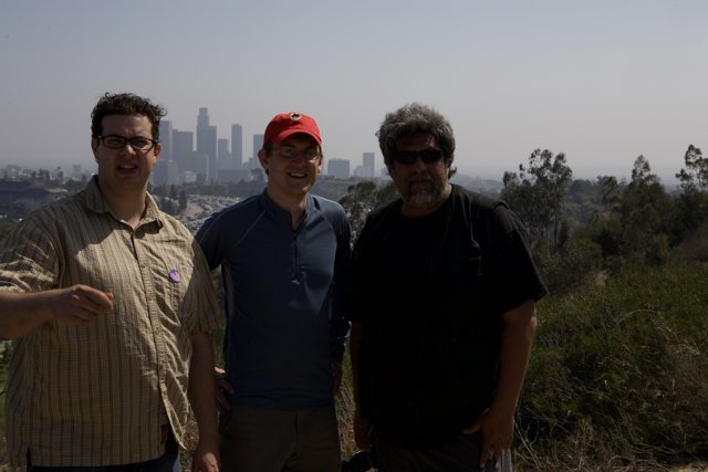Three Men Enjoying a City View