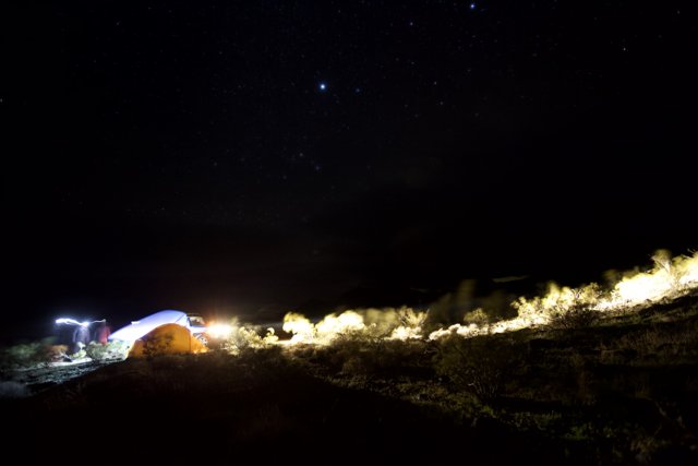 Mountain Tent Camping Under a Starry Night Sky