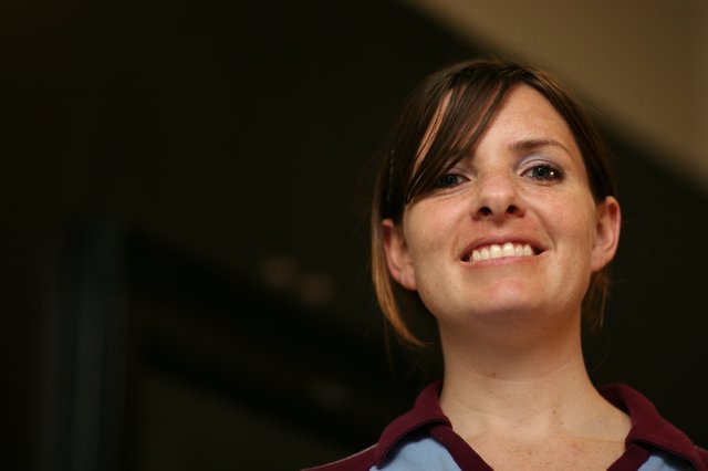 Candid Portrait of a Smiling Woman Looking Up