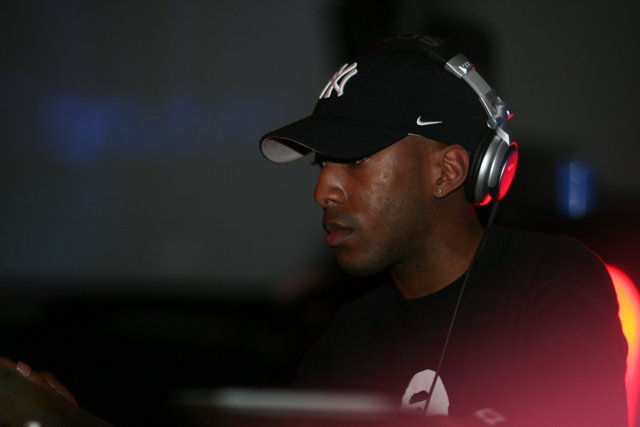 Black-Shirted Deejay with Headphones
