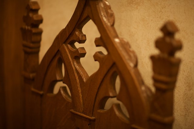 Intricate Carvings on a Wooden Chair