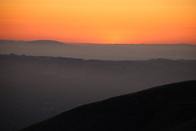 Layered Dusk Silhouettes Over California's Hazy Valleys