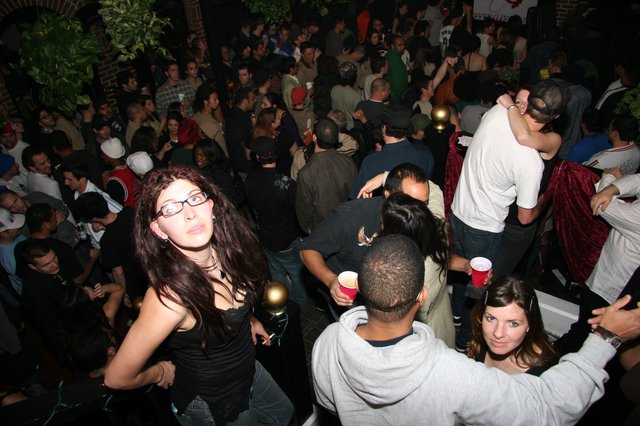 Crowded Indoor Party Scene on Christmas Eve 2005