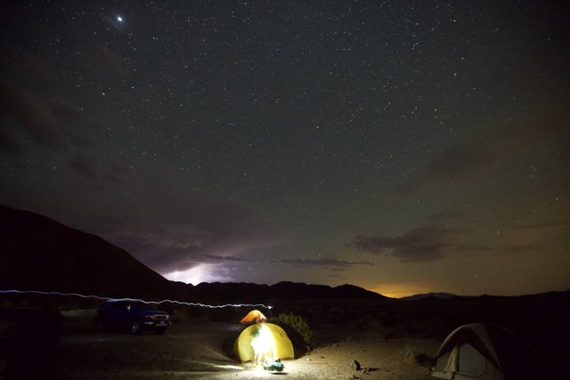Lightning strikes at Night Sky Desert Camp