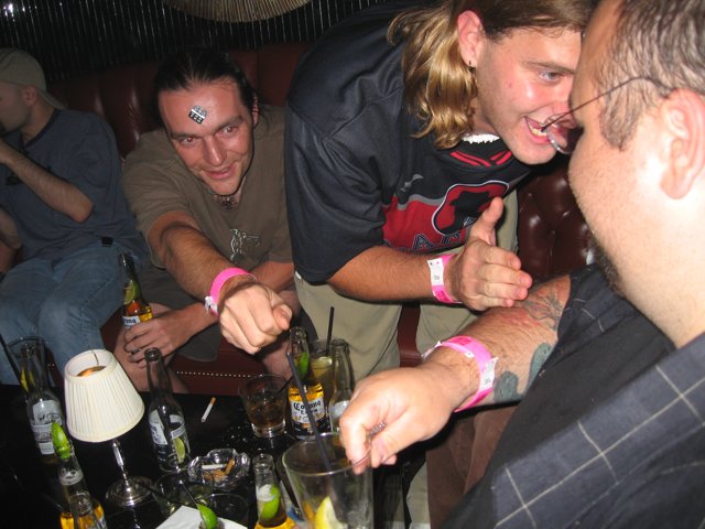 Four Friends Enjoying a Stout at the Pub