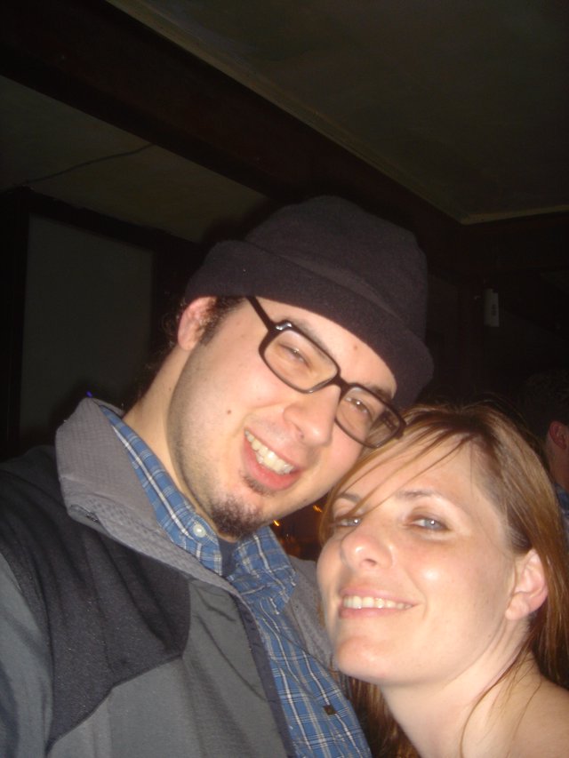 Dave and Penelope Smiling Together at Indoor Venue
