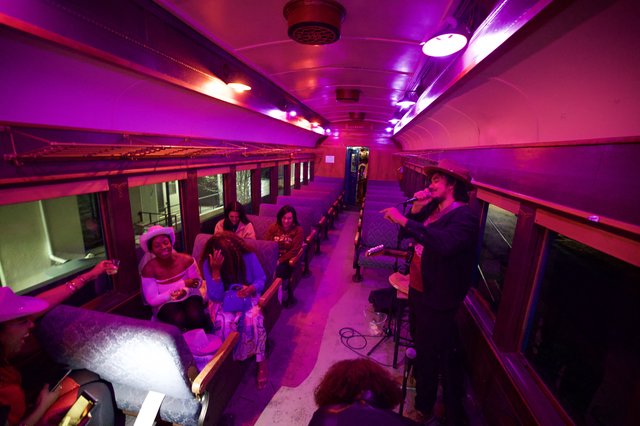 Intimate Live Performance Inside Converted Train Car Venue