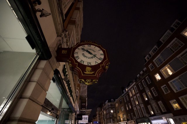 Historic Fortnum & Mason Clock at Night in London