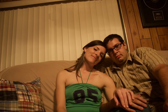 Couple Relaxing Together on Couch at Home