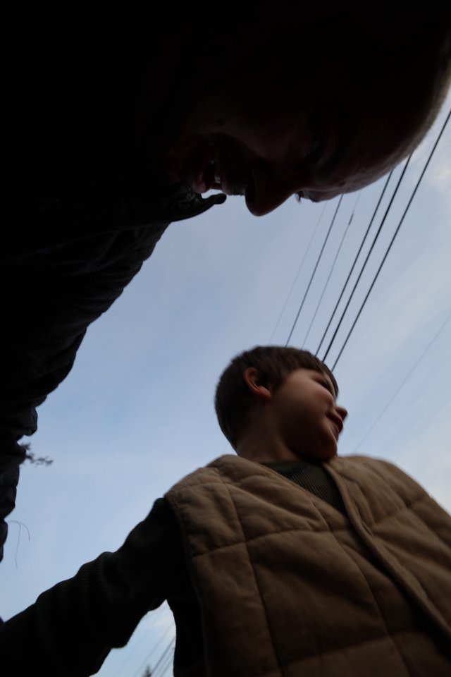 Low Angle Portrait of Person in Brown Jacket