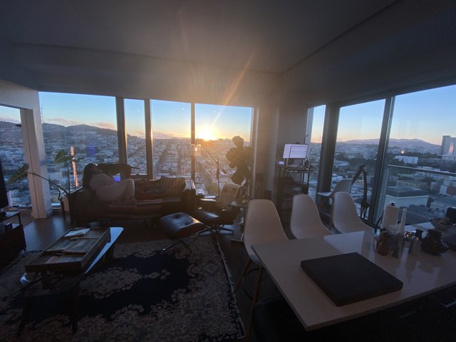 Sunset View from a Luxurious Penthouse Living Room