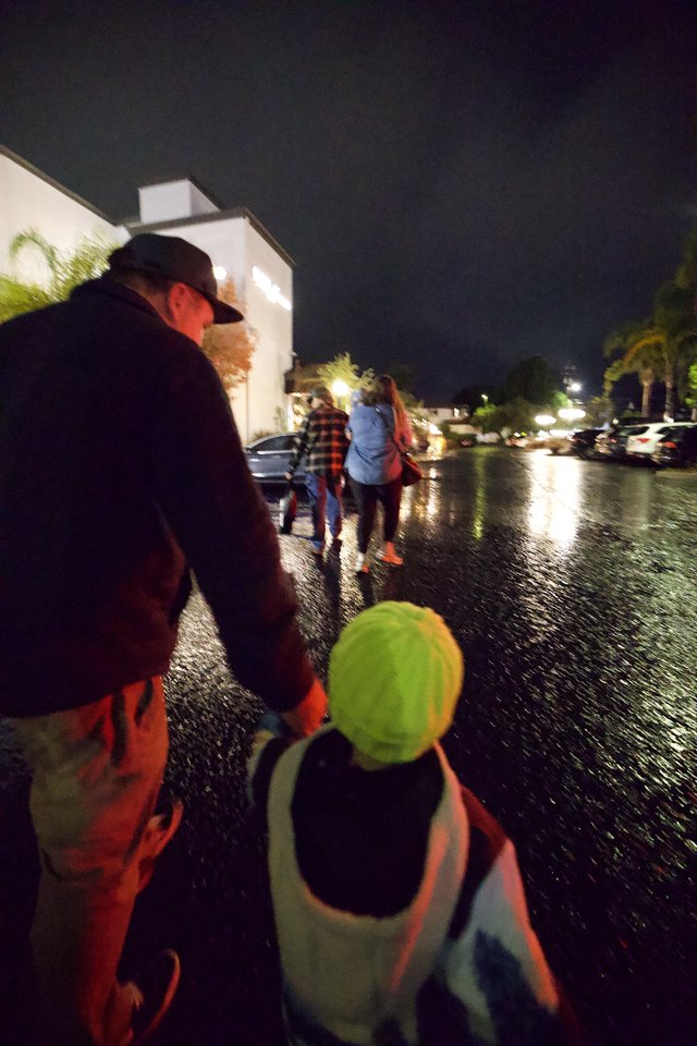 Nighttime Emergency Response in Rainy Parking Lot