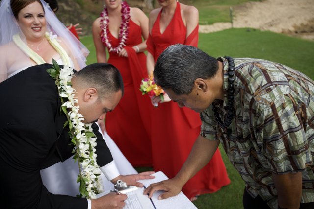 Signing the Marriage Certificate in a Beautiful Outdoor Ceremony