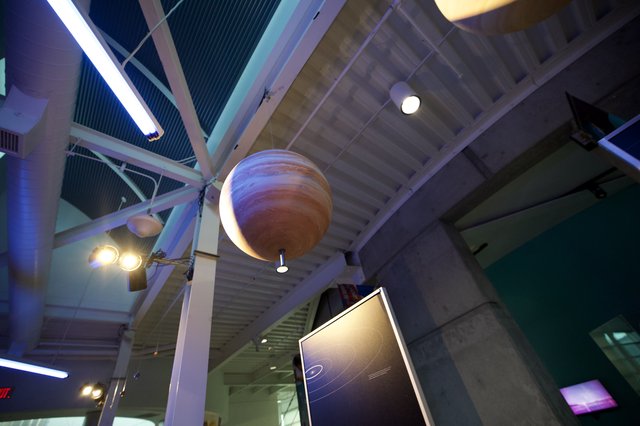 Illuminated Jupiter Model in Science Museum Exhibit