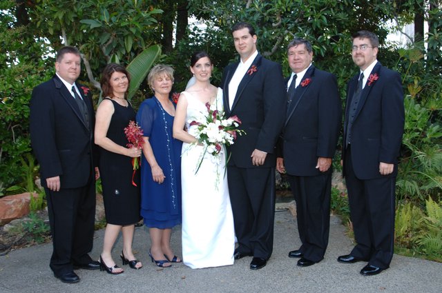 Family Wedding Portrait in Lush Garden Setting